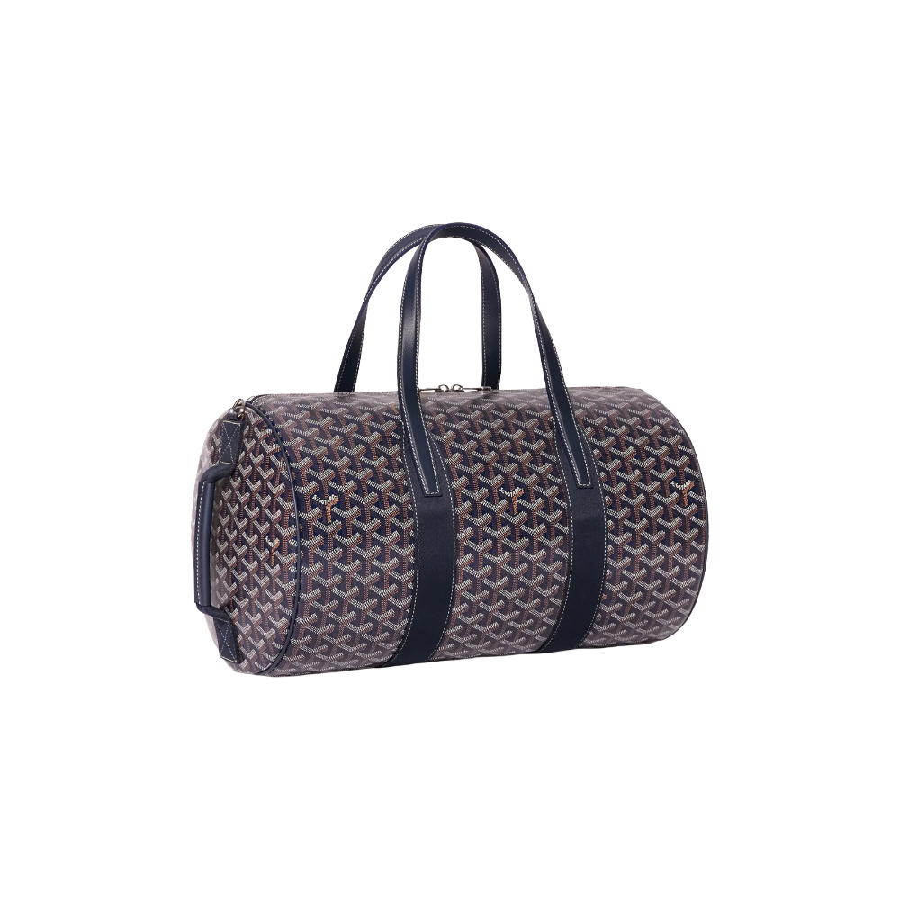 Angled view of Goyard Barrel 40 Sports Bag in Navy Blue highlighting adjustable strap attachments and premium calfskin trim – shop designer bags at McKickz.