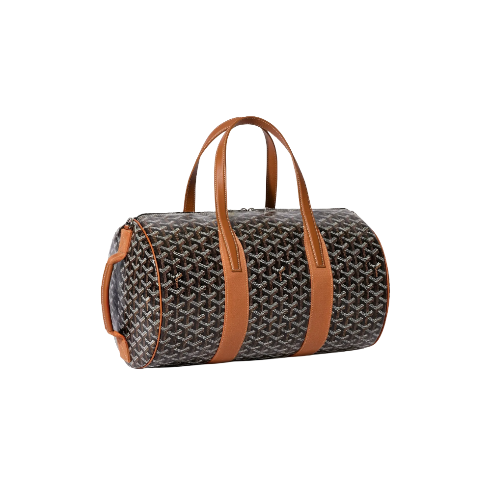 Angled view of Goyard Barrel 40 Sports Bag in Black and Tan highlighting adjustable strap attachments and premium calfskin trim – shop designer bags at McKickz.