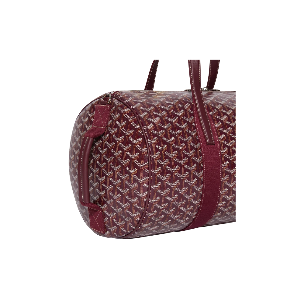 Close-up of Goyard Barrel 40 Sports Bag in Burgundy Red with signature Goyardine canvas and palladium hardware, side handle view – available at McKickz.