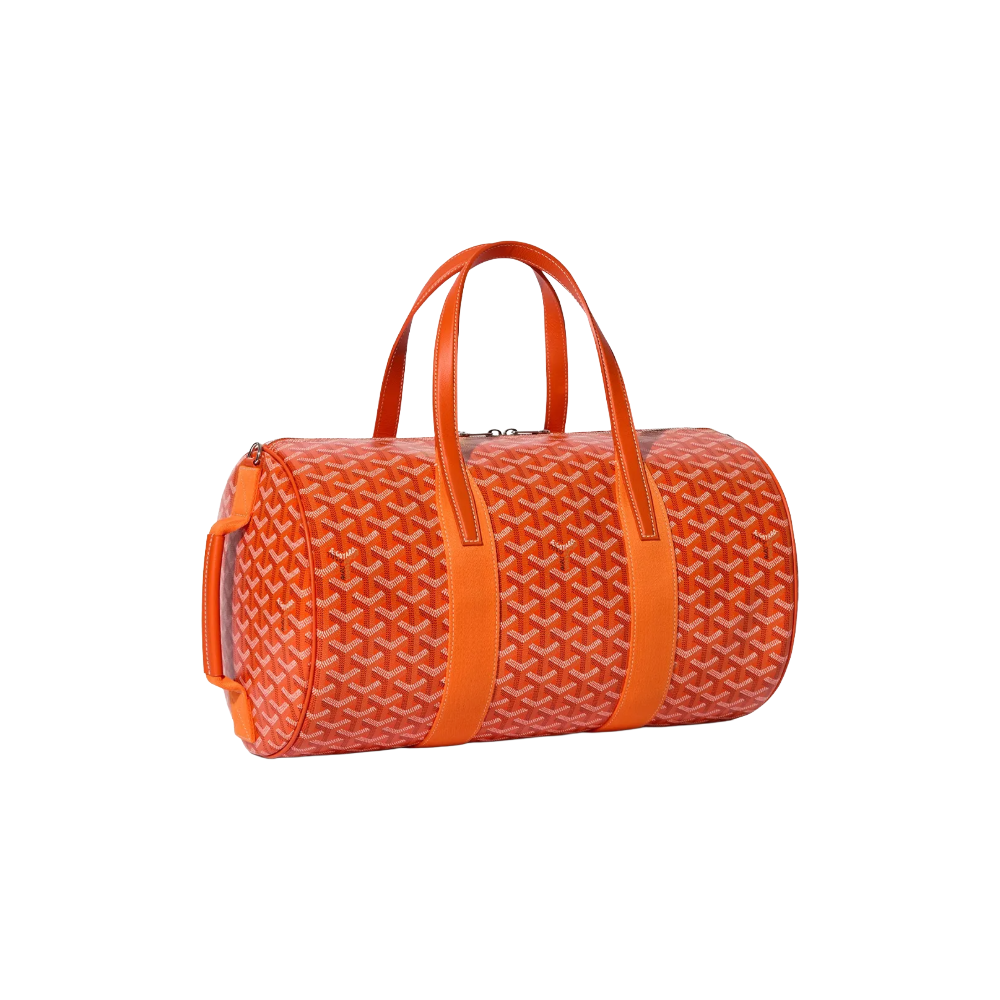 Angled view of Goyard Barrel 40 Sports Bag in Orange highlighting adjustable strap attachments and premium calfskin trim – shop designer bags at McKickz.