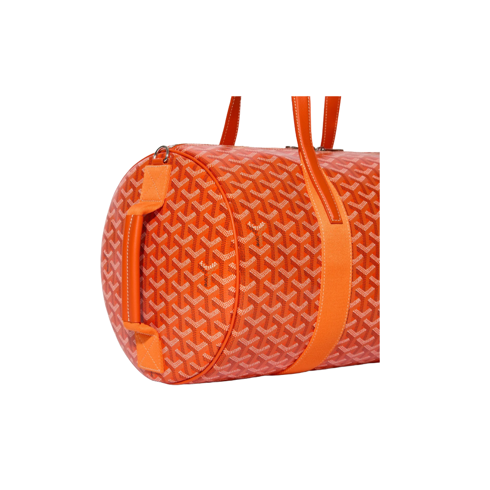 Close-up of Goyard Barrel 40 Sports Bag in Orange with signature Goyardine canvas and palladium hardware, side handle view – available at McKickz.