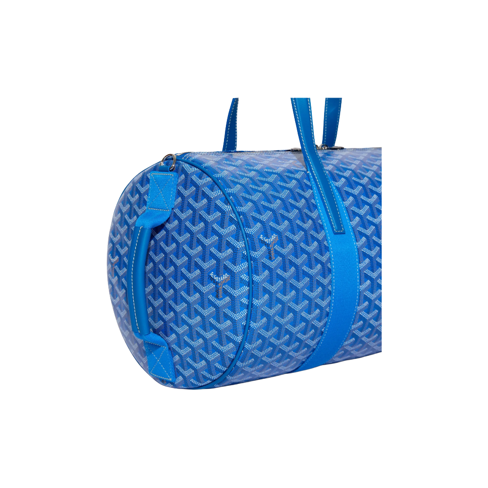 Close-up of Goyard Barrel 40 Sports Bag in Sky Blue with signature Goyardine canvas and palladium hardware, side handle view – available at McKickz.