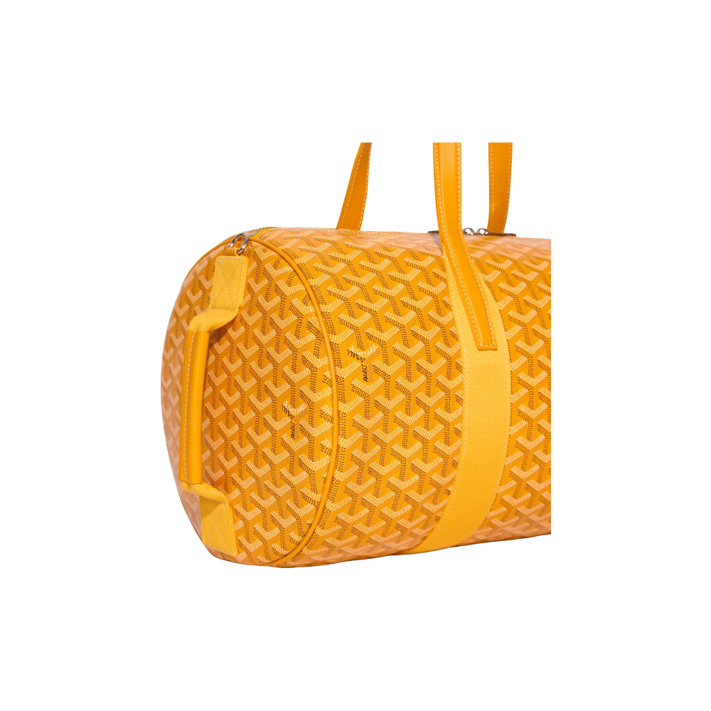 Close-up of Goyard Barrel 40 Sports Bag in Yellow with signature Goyardine canvas and palladium hardware, side handle view – available at McKickz.